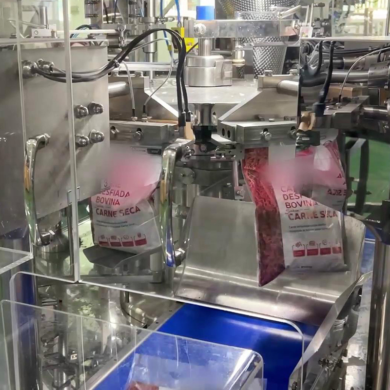 Kişiselleştirilmiş Verimli Dehidratlı Sığır Eti Nuggets Kütlelendirme Paketleme Makinesi Yiyecek Hazır Sığır Eti Çoklu Başlı Ağırlatıcı