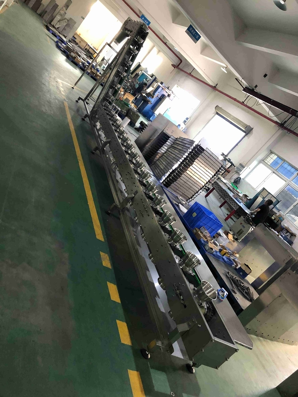 0.75KW Turşu Paketleme Makinesi Ölçülebilir Gıda Güvenli Kase Tipi Damperli Konveyör Yamalar İçin Bloklar