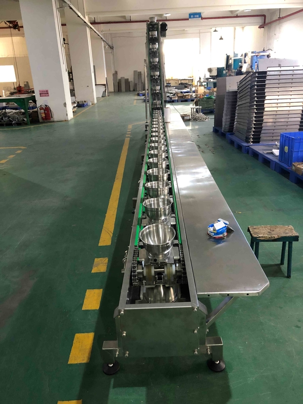 0.75KW Turşu Paketleme Makinesi Ölçülebilir Gıda Güvenli Kase Tipi Damperli Konveyör Yamalar İçin Bloklar